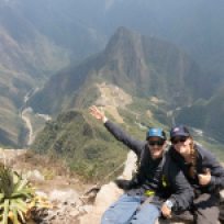 Gipfelfoto mit super Ausblick auf die Machu Picchu Ruinen